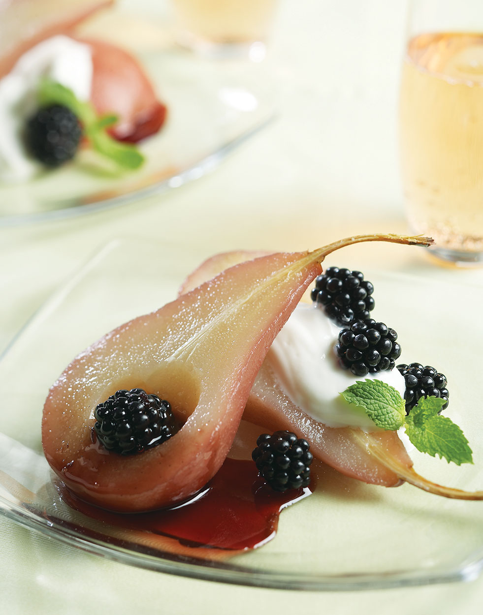 Wine-poached pears with vanilla-cinnamon sauce Recipe